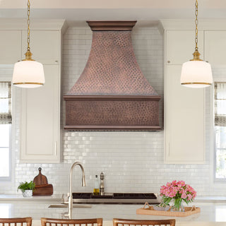 Modern kitchen with copper range hood