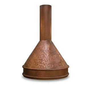a copper artisan range hood with an embossed landscape