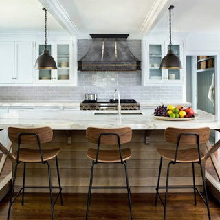 modern kitchen with zinc range hood