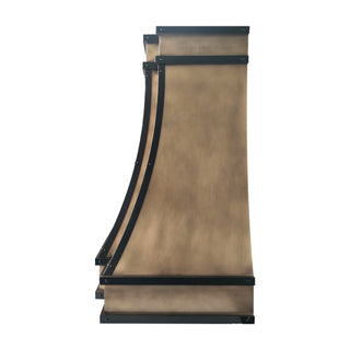 a modern curved wall mount aged brass kitchen range hood with oil rubbed bronze straps and rivets