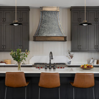 modern kitchen with a elegant kitchen range hood