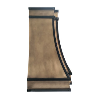 the side of custom wall mount aged brass range hood 