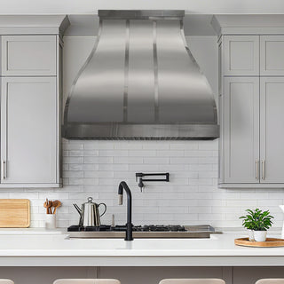 Modern kitchen with stainless steel range hood