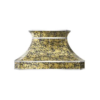brass range hood with gold and black speckled pattern