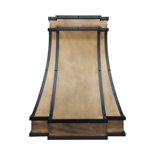 a rustic industrial aged brass range hood with oil rubbed bronze straps and round rivets