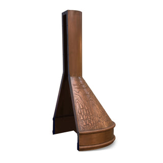 a decorative copper range hood with embossed floral and scrollwork patterns
