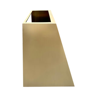 side profile of sleek tapered brushed brass range hood