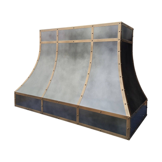 Right angle view: Zinc range hood, a statement piece for upscale industrial home kitchens.