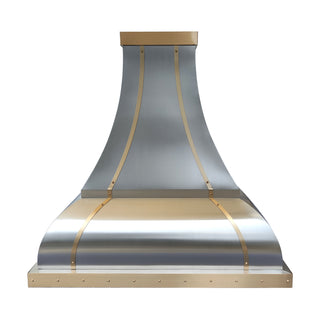 Stainless steel range hood with gold accents on a white background