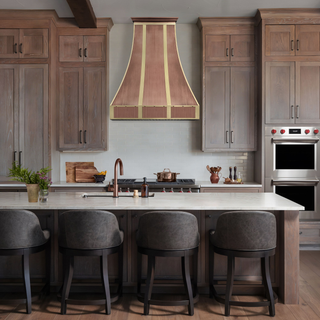Vintage kitchen with SINDA custom antique copper range hood.