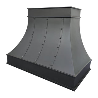 handcrafted kitchen vent hood with straps & rivets