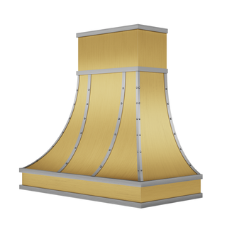 Right angled view of a brushed brass vent hood: Flared profile, paired with brushed stainless steel straps and round rivets.