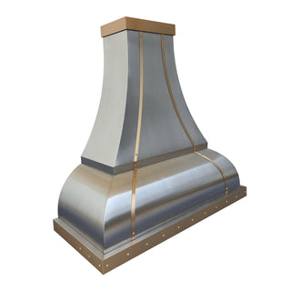Stainless steel range hood with bronze accents on a white background
