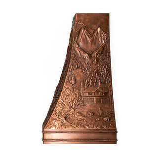 Hand‑hammered solid copper range hood with full‑body 3D forest ranch mountain relief carving, antique copper finish, tapered trapezoid shape
