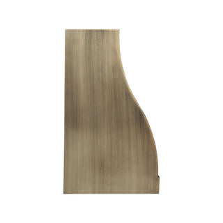 the side of a sleek antique brass range hood