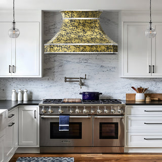 modern kitchen with curved black gold brass range hood