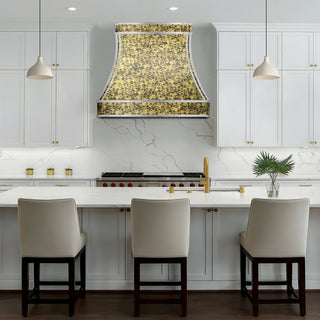 Modern kitchen with white cabinets, marble countertop, and decorative copper range hood