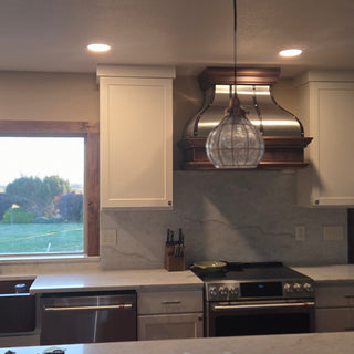 sinda handcafted copper range hood with copper straps