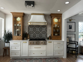 Modern kitchen with white stainless steel range hood