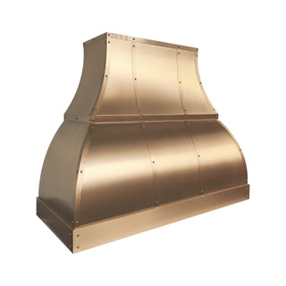 kitchen brass range hood with a brushed straps and rivets 