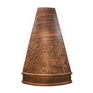 detailed view of the tropical palm tree motif on a copper range hood