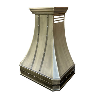 luxury antique brass range hood in a farmhouse kitchen